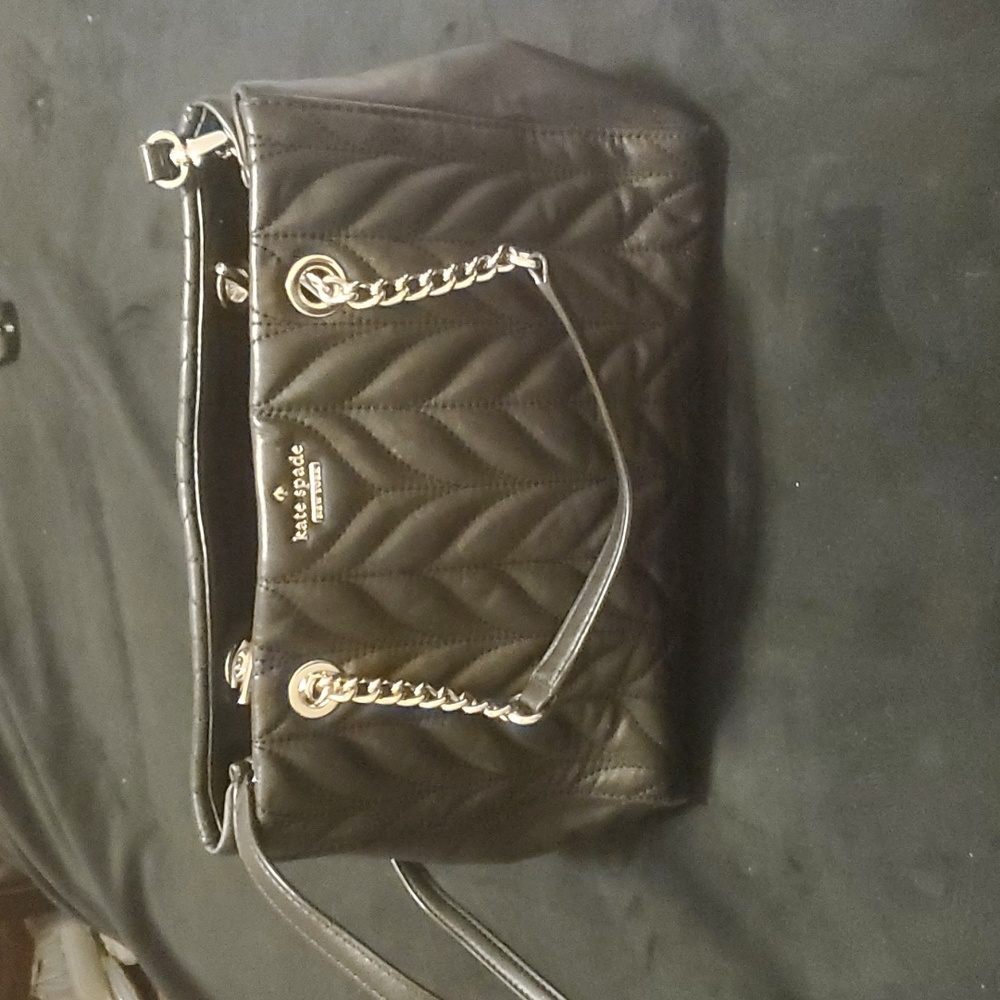 Kate Spade New York leather purse black with gold hardware.Perfect for e…